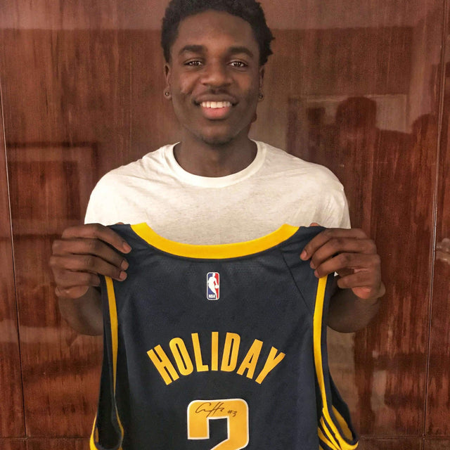 Aaron Holiday Autographed Jersey