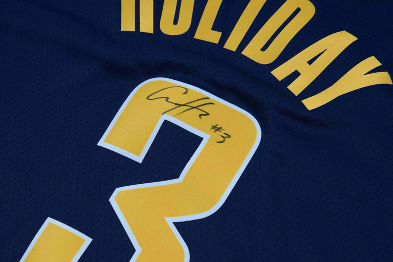 Aaron Holiday Autographed Jersey